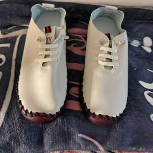 White Kids Shoes with Red Accents